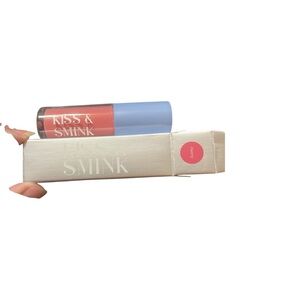 Kiss and smirk cosmetics